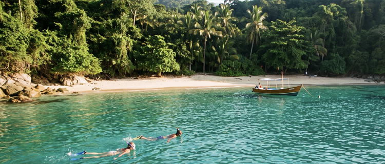 Snorkelers exploring the granite arches of Los Arcos Marine Park near Puerto Vallarta