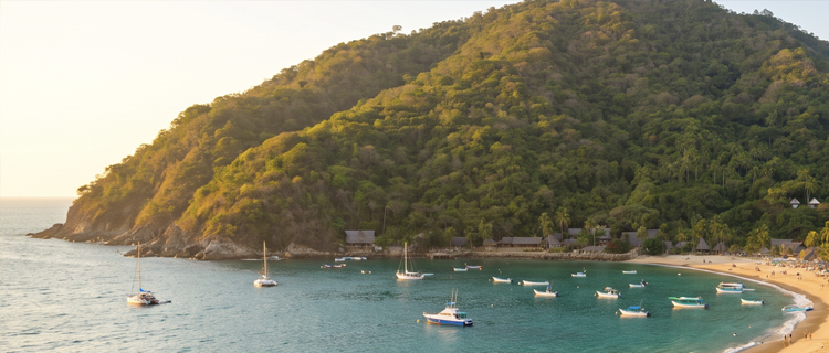 The jungle-backed cove and beach of Yelapa village reached by boat near Puerto Vallarta